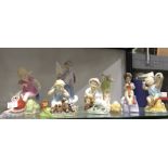 A collection of seven Royal Worcester Doughty figures including months of the year and a Crown Derby