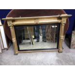 A Regency gilt wood overmantel, circa 1820, breakfront cornice, acanthus moulded column surround