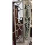 A pair of mirrored glass panelled three fold floor standing screens, 212cm high. (2)