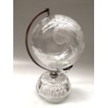 A Waterford cut glass globe on stand, 30cm high