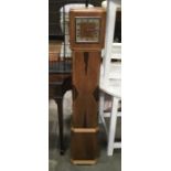 An Art Deco mahogany and rosewood parquetry inlaid grandmother clock, 131cm high