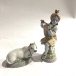 Two Lladro figures, Sacred Cow 08123, boxed and another Lord Krishna 08122 (2)