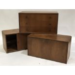 Three mid Century teak Ladderax style modular cabinets, including a three drawer unit with metal