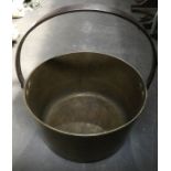 A vintage brass jam preserve pot, with iron handle