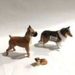 Three Royal Doulton dog figures, including a boxer, 17cm high, Collie and a recumbent St Bernard (3)