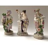 A pair of Meissen style figures, one modelled as a gentleman with dove, the other as lady with