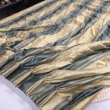 A pair of professionally made single Taffetta/silk lined full length curtains with teal and gold