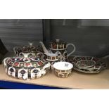 A Royal Crown Derby Imari 1128 pattern tea ware and dishes, including teapot, bowl and jug (6)