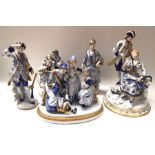 A Capodimonte blue and white glazed figure group Dutch fisherman and companions, on oval base with