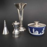 An Edwardian silver pepper mill, Hukin & Heath, Birmingham 1908, a Victorian trumpet vase, Horace