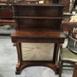 A Regency rosewood console/ hall table, fitted shelf back above plain top and single drawer, on C