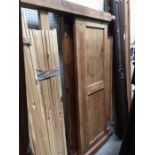 A panelled pine bed, turned urn finials, 167cm maximum width