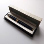 A Parker 17 fountain pen, blue with gold trim, with box and papers