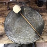 A large brass gong and kid skin mallet, 44cm diameter