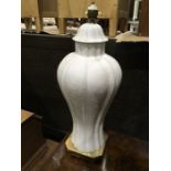 A Chinese style porcelain lamp base, Meiping form, with faux cover, on gilt metal chamfered and