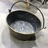 A large metal jam pan with handle, 45cm diameter