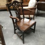 A Country oak Chippendale style armchair; planked seat on square tapered supports