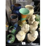 A collection of ceramics, including a set of busts
