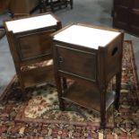 A pair of mahogany marble top pot cupboards, fitted single door fluted and tapered supports on block