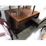 A mahogany and crossbanded sofa table, mid 19th century, fitted two drawers and opposing dummy
