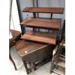 An oak 1930's drop leaf table, on barley twist supports together with two, two-tier display