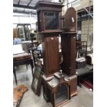 An oak longcase clock case and a mahogany crossbanded example (2)