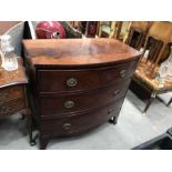 A George III mahogany bow front chest of three graduated drawers, 91.5cm wide, 91cm high