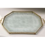 A large gilt metal and glass tray together with a chromed glass example 65cm long (2)
