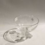 A Lalique glass pedestal bowl, the triform base modelled as three fish, 19.5cm diameter