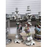 A pair of Plaue Schierholz porcelain figural four branch candelabra 56cm high (2)