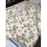 A pair of professionally made glazed cotton curtains, decorated with honeysuckle and butterflies,