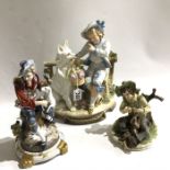 A Continental bisque porcelain figure group, boy with dog carrying a flower filled basket, 29cm