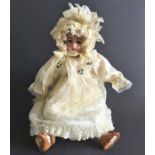 A French bisque head doll, sleeping brown eyes, painted open mouth and exposed teeth, composite