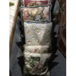 A collection of needlepoint and machined tapestry cushions, including Aubusson style examples (11)