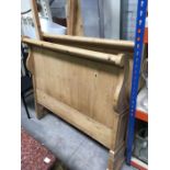 An antique style pine sleigh bed, with rails, 121cm maximum width