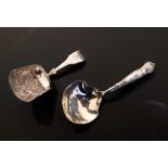 Two Georgian silver tea caddy spoons, one by William Lea & Co, Birmingham 1814, bowl embossed with