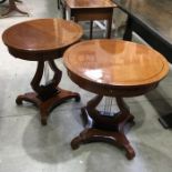 A pair of reproduction oval side tables on lyre supports, fitted single drawer quatrefoil base and