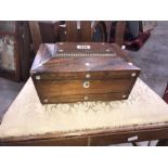 A Regency rosewood work box, circa 1820, sarcophagus form with mother of pearl inlay, 28cm wide, a