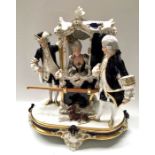 A Royal Dux porcelain figure group, Sedan chair with figures and recumbent dog, 39cm high