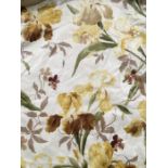 A pair of chintz glazed cotton professionally made curtains, printed in autumnal hues with gulag