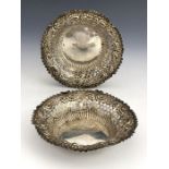 A pair of Edwardian reticulated silver dishes, Britton, Gould and Co., Birmingham 1903