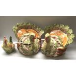 A pair of Italian porcelain soup tureens and covers modelled as vegetable formed turkeys, and a pair