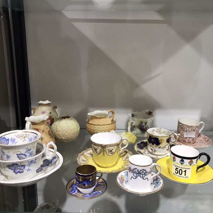 A collection of Royal Worcester coffee cans, teacups and blush ivory vases (12+)