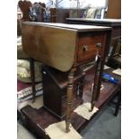 An early Victorian mahogany drop-flap side table, fitted single drawer and dummy drawer on turned