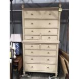 A pair of large painted chests, Louis XVI style, two drawers over three graduated drawers, on shaped