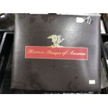 Historic Stamps of America, a large vinyl album wi