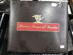 Historic Stamps of America, a large vinyl album wi
