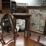 An Edwardian mahogany oval swing toilet mirror on stand, a tapestry fire screen and an occasional