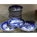 Fifteen Royal Copenhagen Christmas plates, 18cm wide (15)