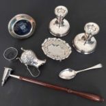 A collection of Elizabeth II silver, to include a circular picture frame by Broadway & co, a pair of
